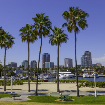 Rainbow Harbor with city skyline at Long Beach , CA